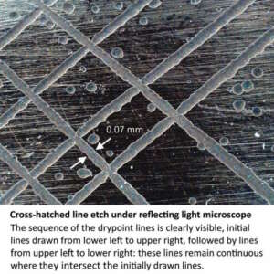 Cross-hatch line etch under reflecting light microscope. The sequence of the drypoint lines is clearly visible , initial lines drawn from lower left to upper right, followed by lines from upper left to lower right. These lines remain continuous where they intersect the initially drawn lines.